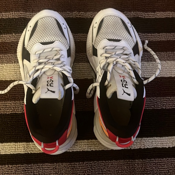 orange and black puma rsx